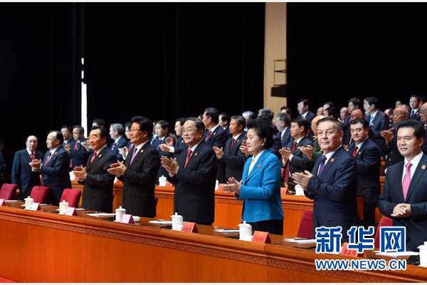 10月1日，慶祝中華人民共和國成立66周年暨新疆維吾爾自治區成立60周年大會在新疆人民會堂隆重舉行。 新華社記者 饒愛民 攝 