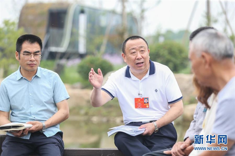 （新華全媒頭條·兩會精神看落實·圖文互動）（2）整體謀劃、系統升級、全面提升——落實全國兩會精神織牢織密公共衛(wèi)生防護網