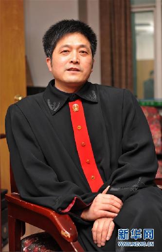 （圖文互動(dòng)）其人如蘭，既潔且馨——追記“全國(guó)模范法官”胡國(guó)運(yùn)