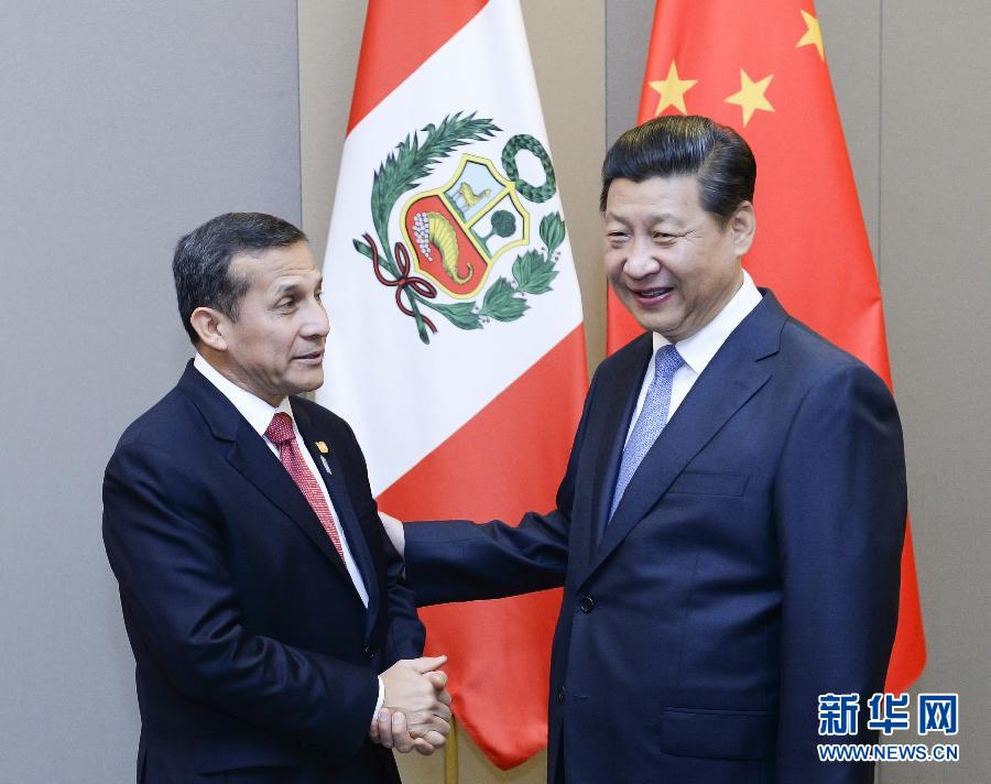 7月16日，國家主席習近平在巴西首都巴西利亞會見秘魯總統(tǒng)烏馬拉。新華社記者 劉建生 攝 