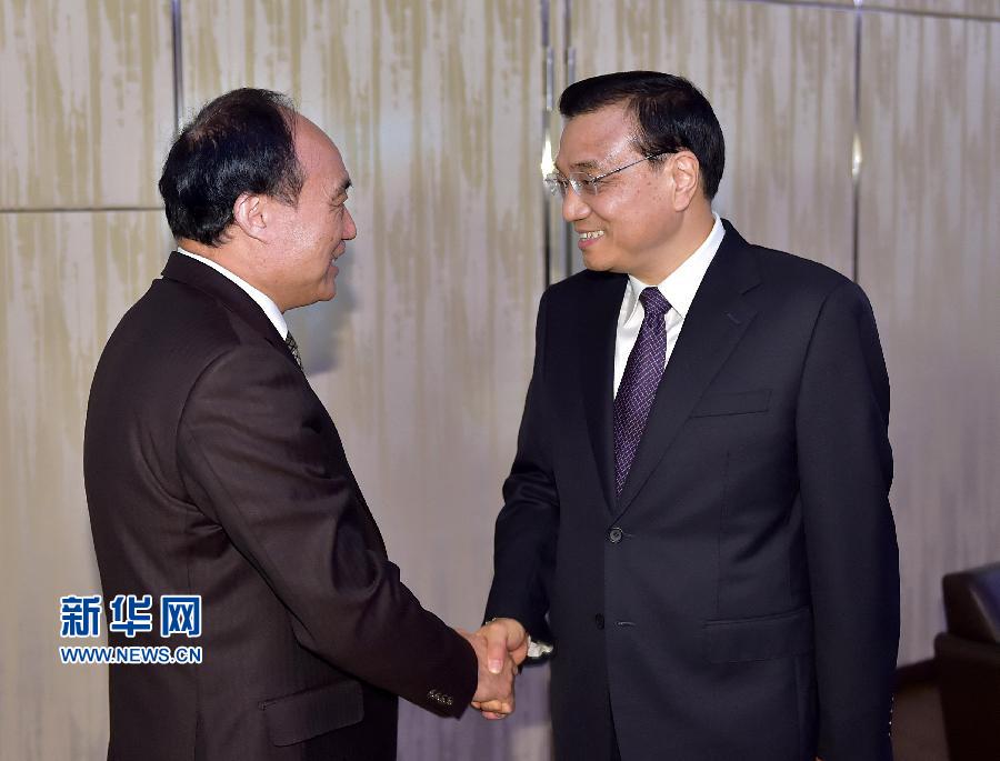 1月22日，中國國務院總理李克強在瑞士蘇黎世會見國際電信聯盟秘書長趙厚麟。 新華社記者 李濤 攝 
