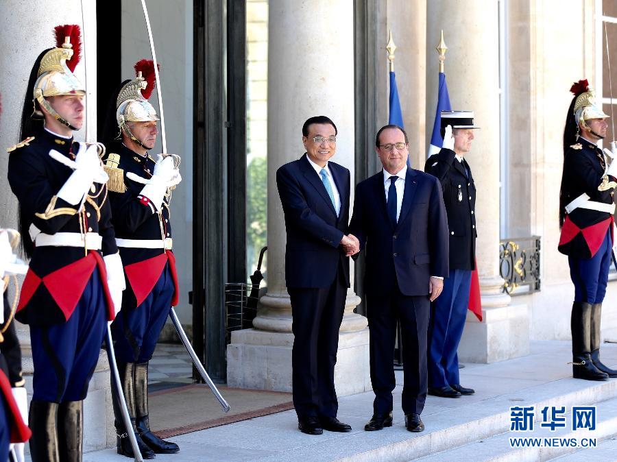 當地時間6月30日下午，中國國務院總理李克強在巴黎愛麗舍宮會見法國總統奧朗德。 新華社記者馬占成攝 