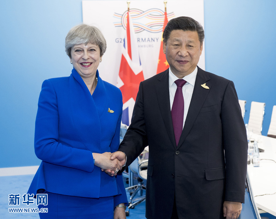 7月7日，國家主席習近平在漢堡會見英國首相特雷莎·梅。 新華社記者李學仁 攝